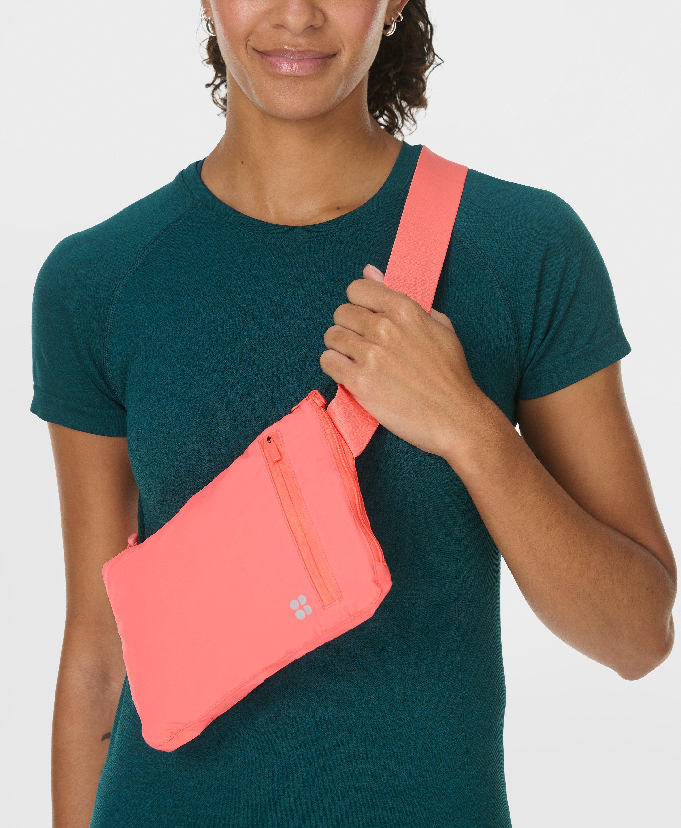 Runner's High Packaway Jacket - Melon Pink